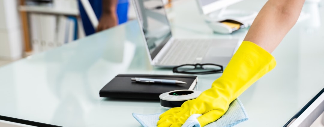 employees of a local commercial cleaning company cleaning an office