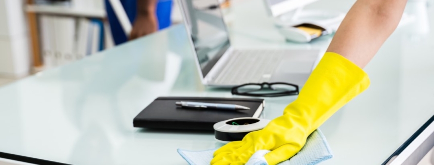 employees of a local commercial cleaning company cleaning an office