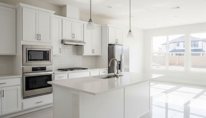 a clean kitchen in a newly constructed home in Kitchener