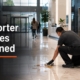 Day porter services guide showing an on-site attendant cleaning a lobby spill in a Kitchener commercial building
